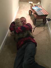 A picture containing indoor, person, sitting, person
	Description automatically generated